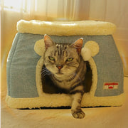 Heated cat cave bed interior showing plush winter lining