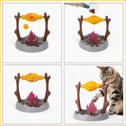 Cat slow feeder toy dispensing kibble during play