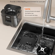 Removable automatic cat feeder food-contact parts being washed and dried